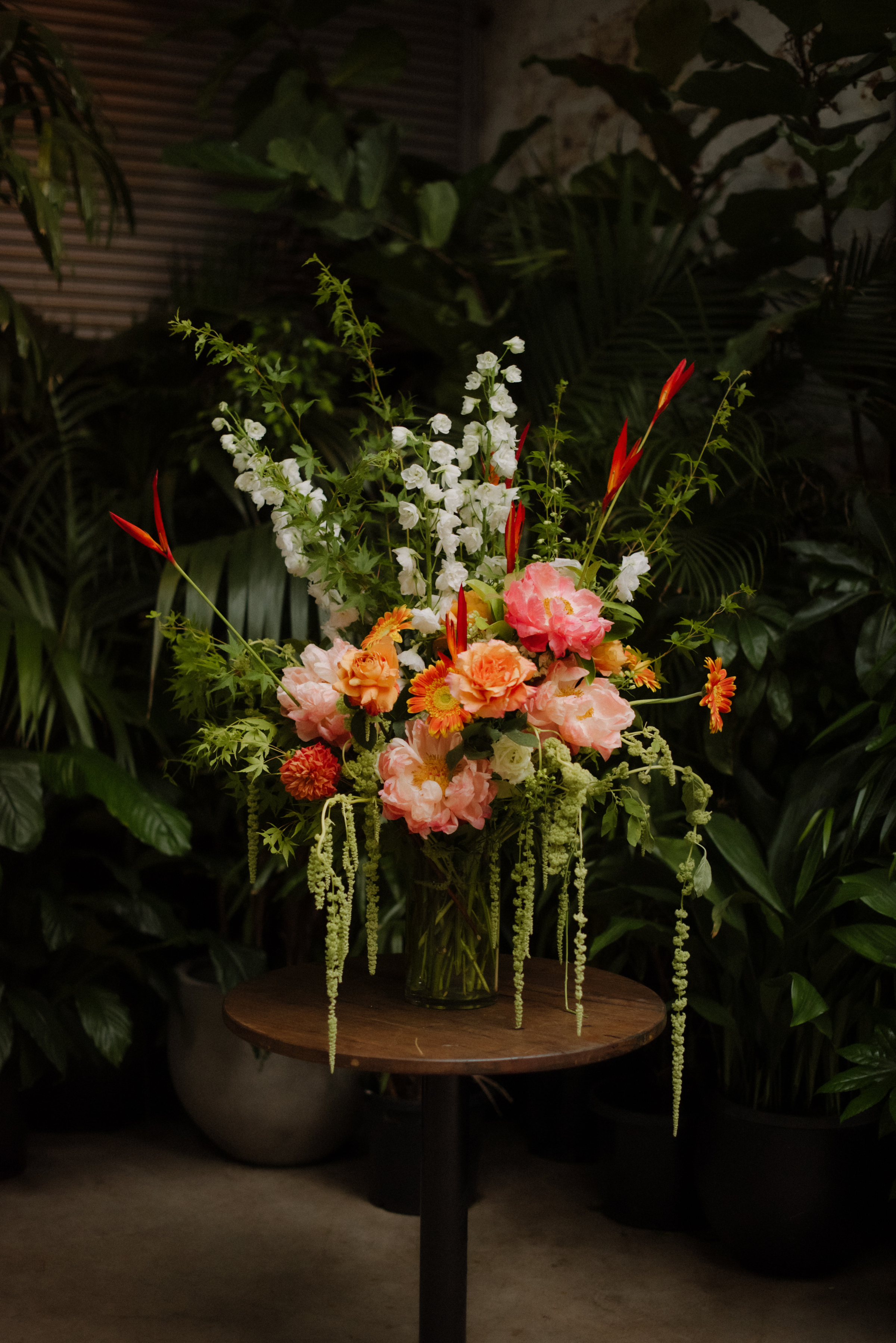 A floral bouquet on a table at Glasshaus Inside in Cremorne.